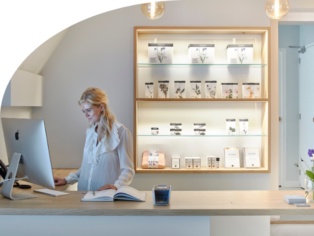 Receptionist at the Five City Spa front desk
